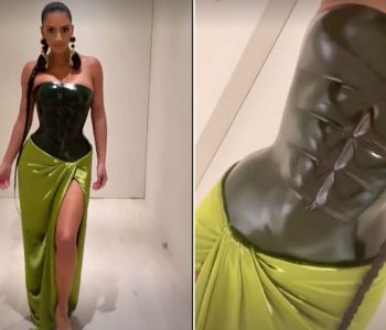 Fustani i Krishtlindjes së Kim Kardashian me muskuj të barkut të gdhendur